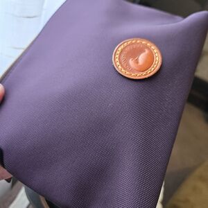 Dooney & Bourke Purple Nylon Pouch Crossbody with Leather Logo